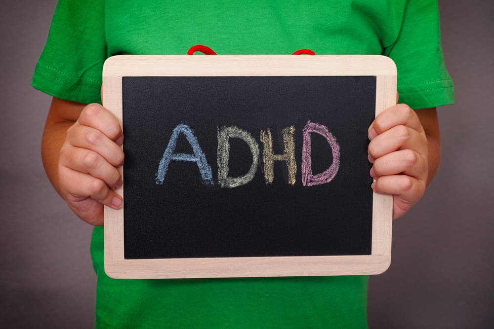 ADHD blackboard held by kid